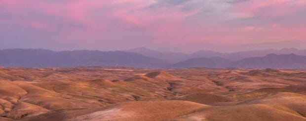 Traditional Berber camp in the Agafay Desert during camel trekking, Enjoy Agafay Desert landscapes